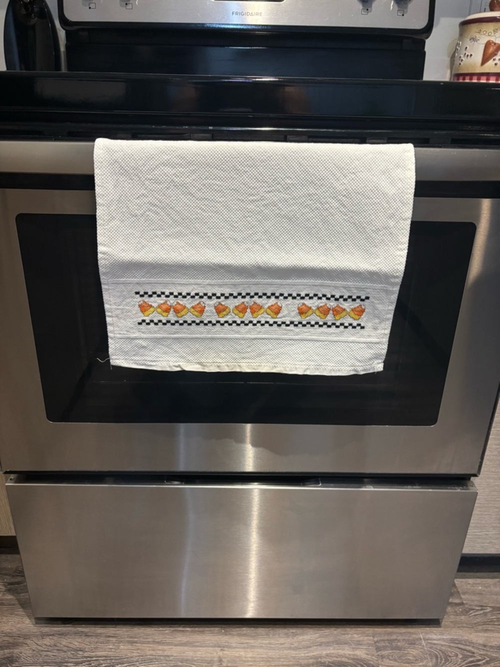 Embroidered White Kitchen Towel with Candy Corn Pattern